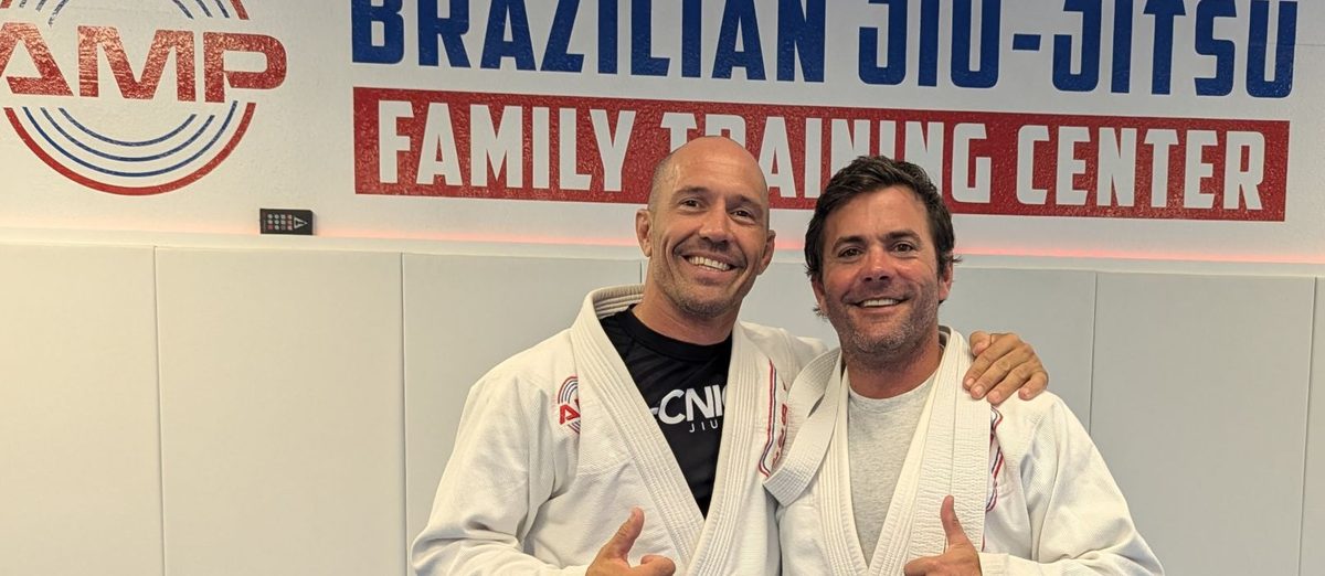 Two AMP BJJ coaches on the mats